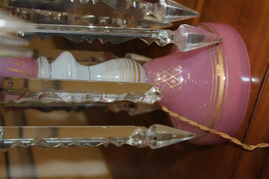 A pair of pink and white gilt decorated glass table lustres, total height 52cm